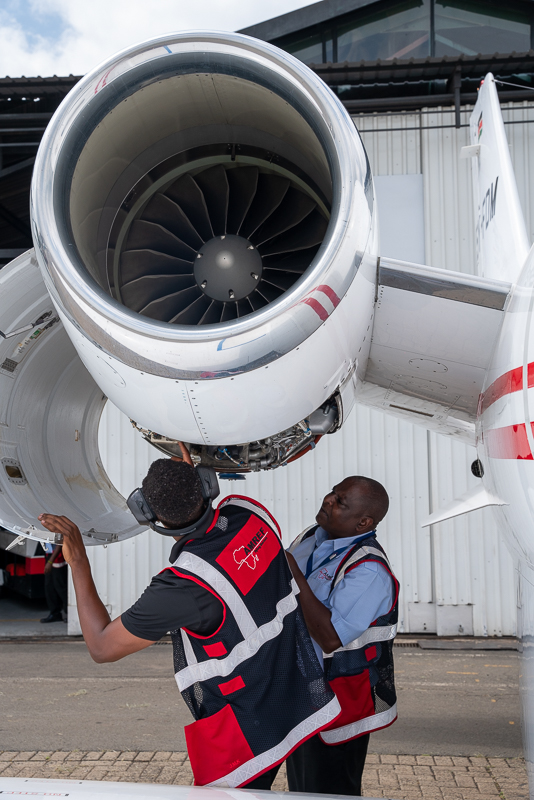 AMREF engineers performing engine maintenance